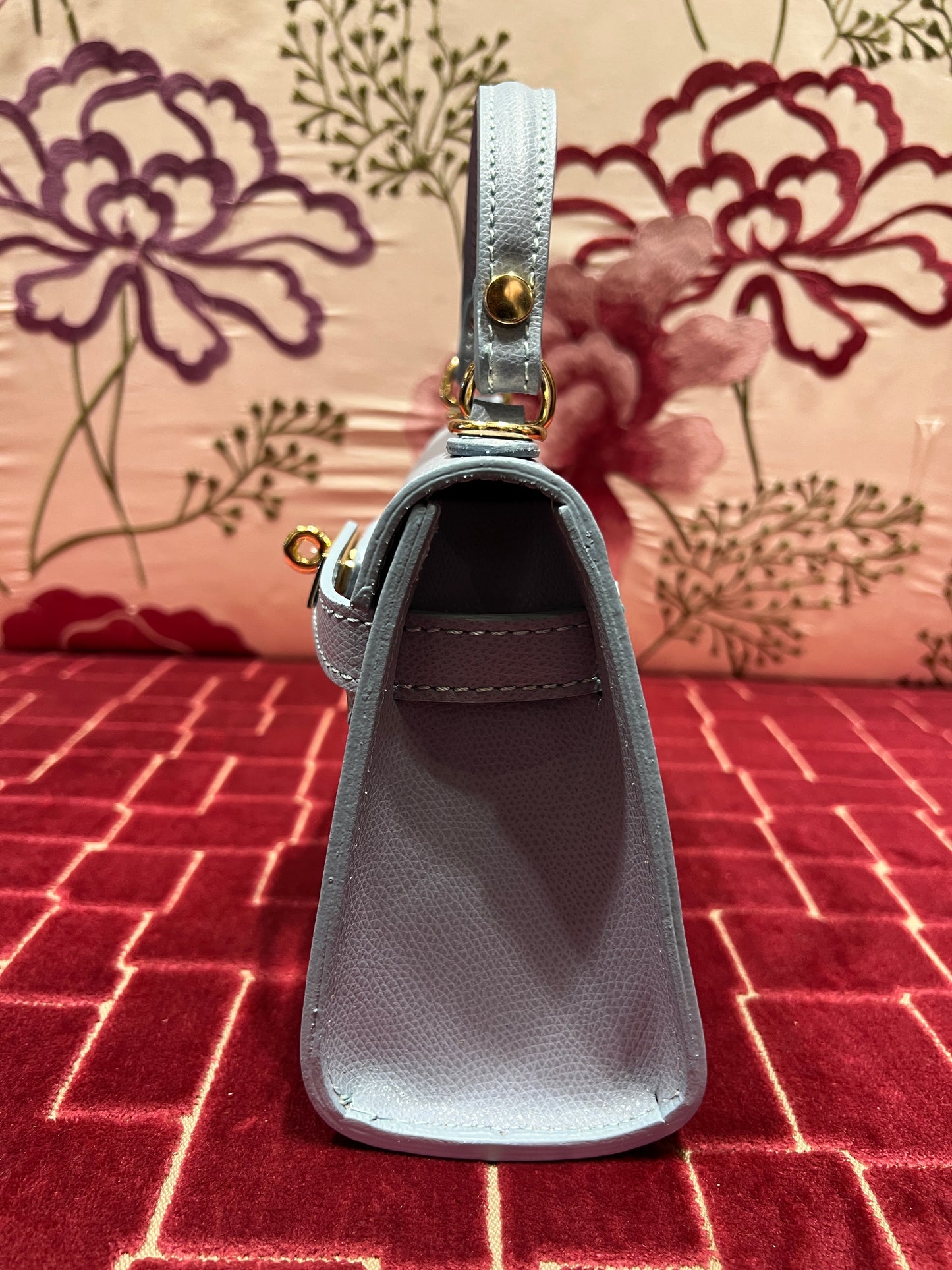 Borsa a mano in pelle celeste con tracolla