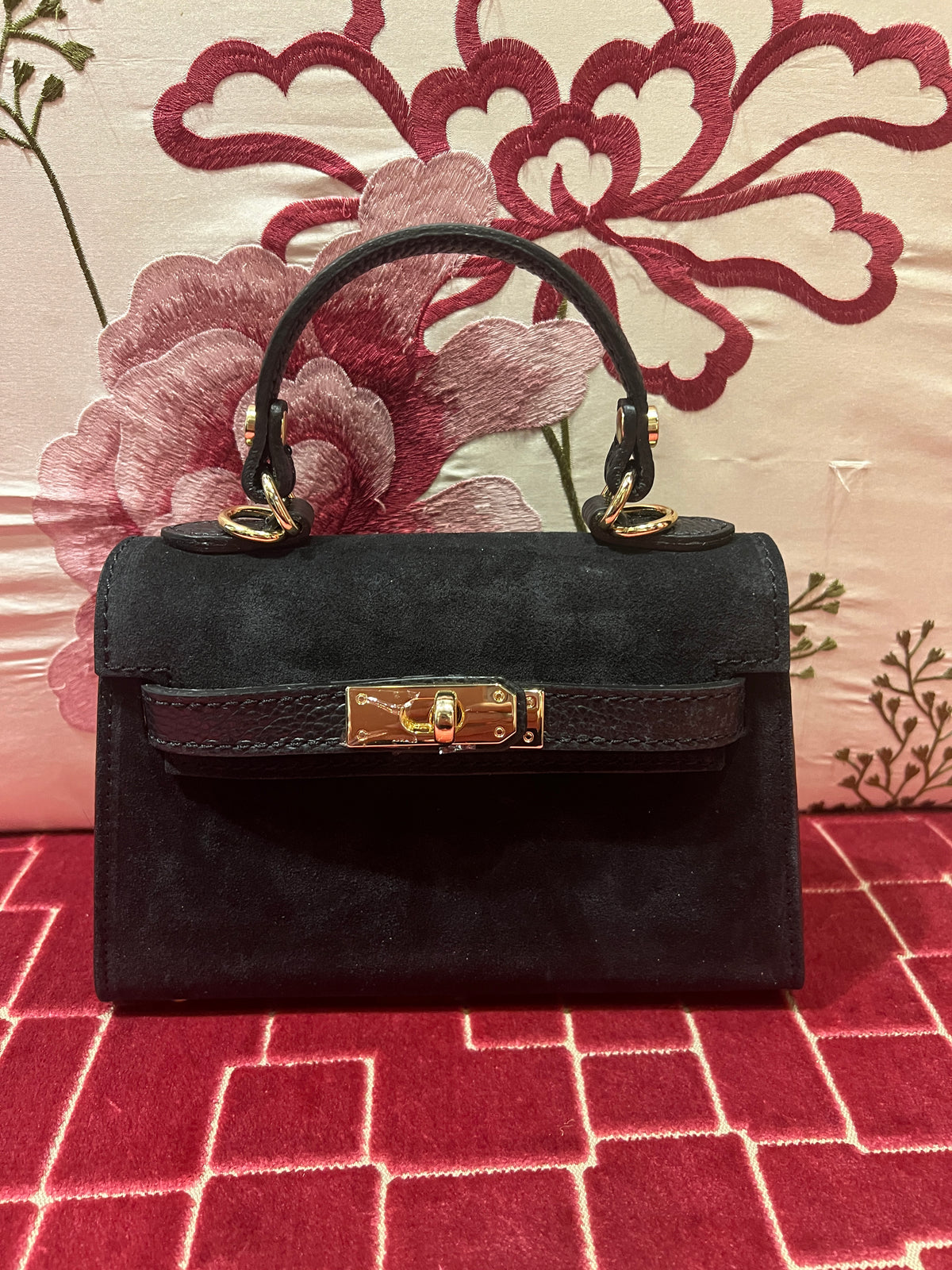 Borsa a mano in pelle scamosciata nera con tracollina