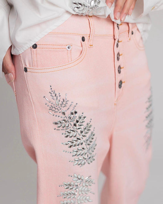 Rossano Perini jeans modello loose rosa pesca con foglie di luce