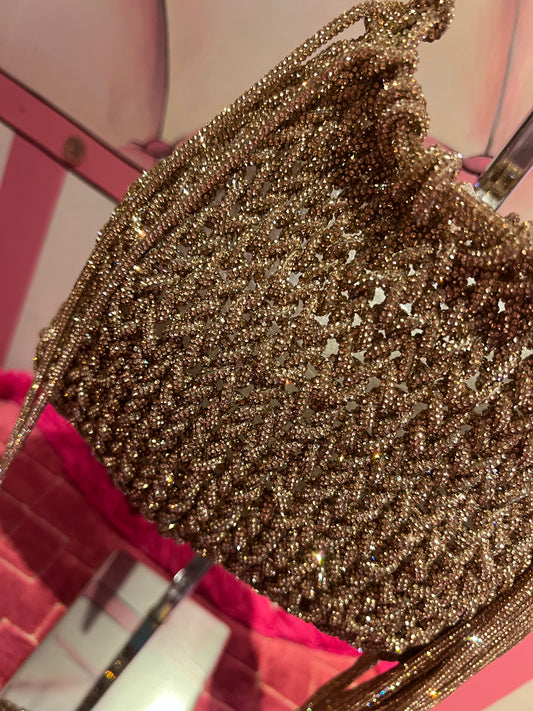 Borsa motivo intrecciato cristalli dorati frange cristalli