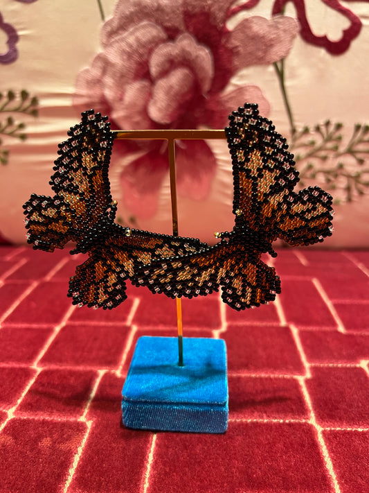 Orecchini farfalle perline nere bronzo