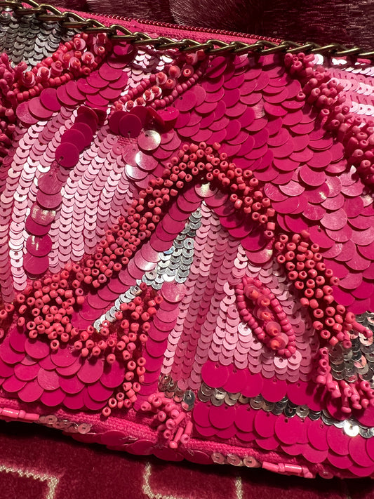 Borsa paillettes e perline fuxia con tracollina