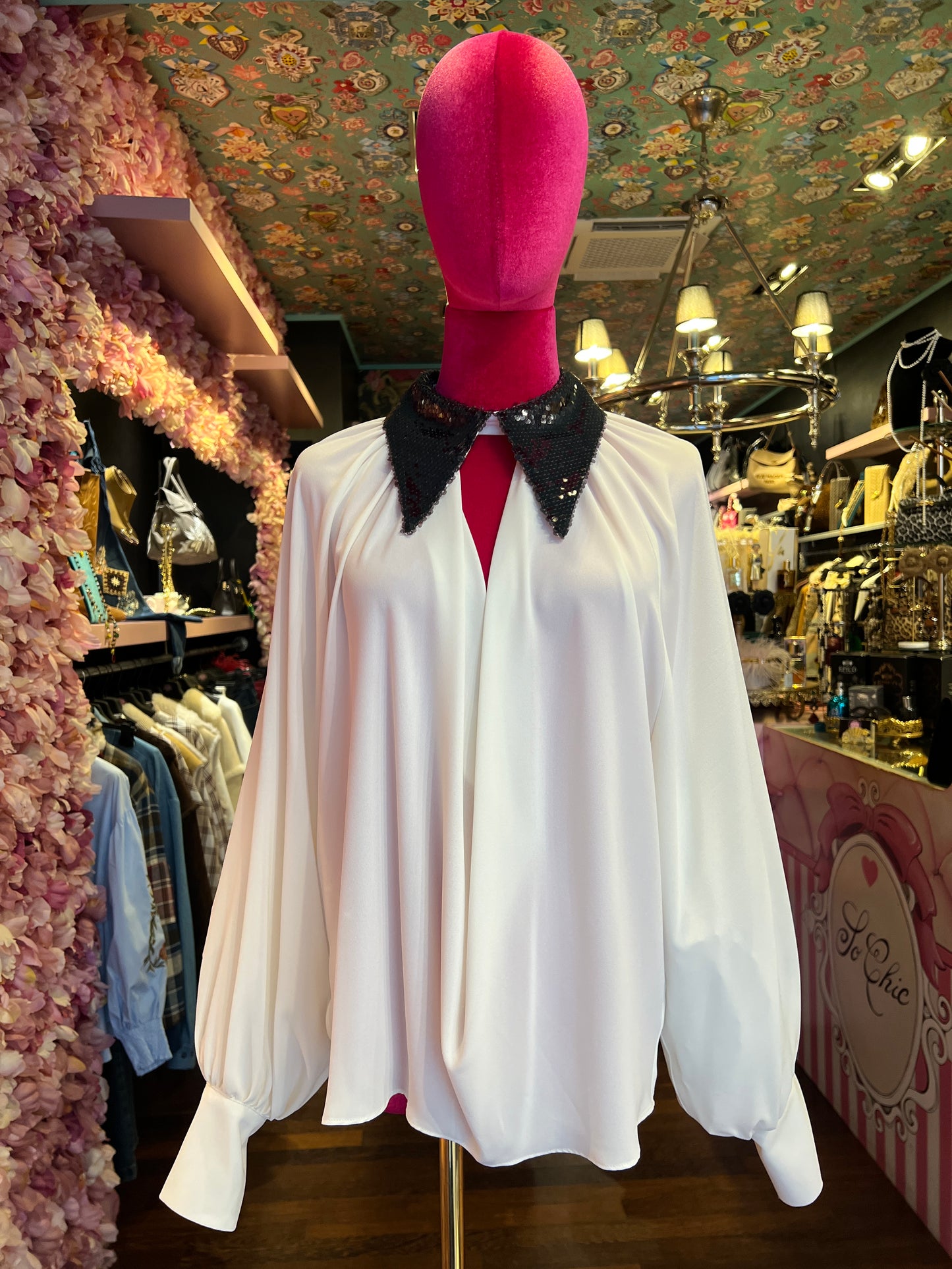 Dahlo blusa drappeggiata con collo di paillettes