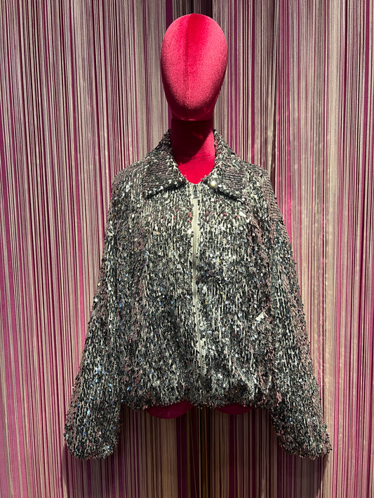 The room completo full paillettes grigio/ argento con fodera in jersey, chiusura zip e tasche per il bomber più pantalone