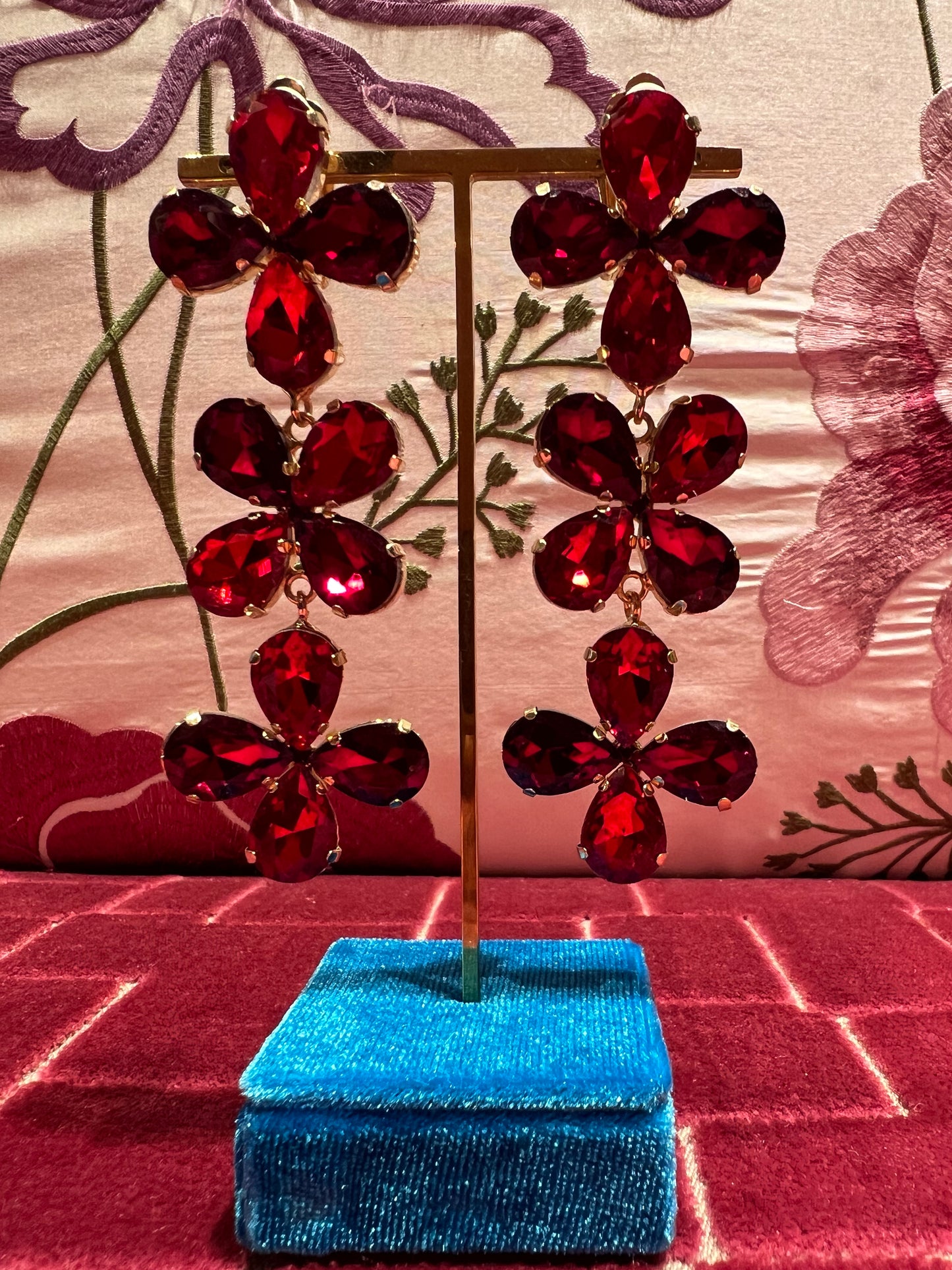 Orecchini clip fiore pietre rosse